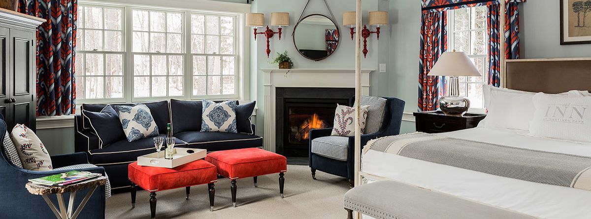 Bedroom with fireplace at the Inn at Hastings Park