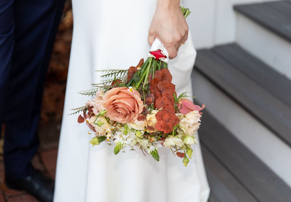 Bride holding flowers