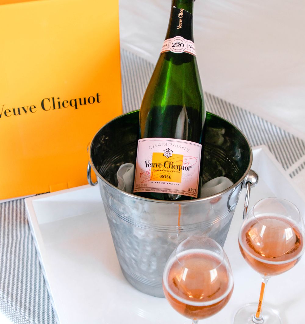 Wine in an ice bucket with cocktails