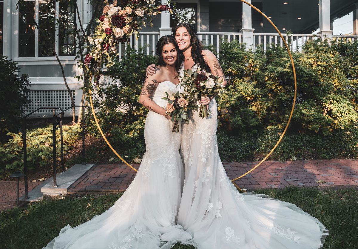 Brides posing outside