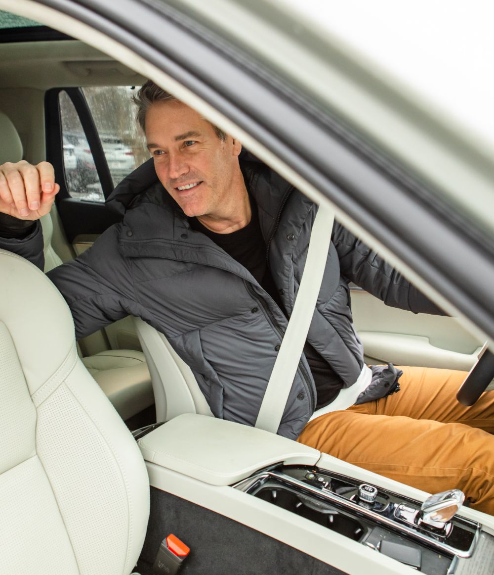 Man sitting in a volvo