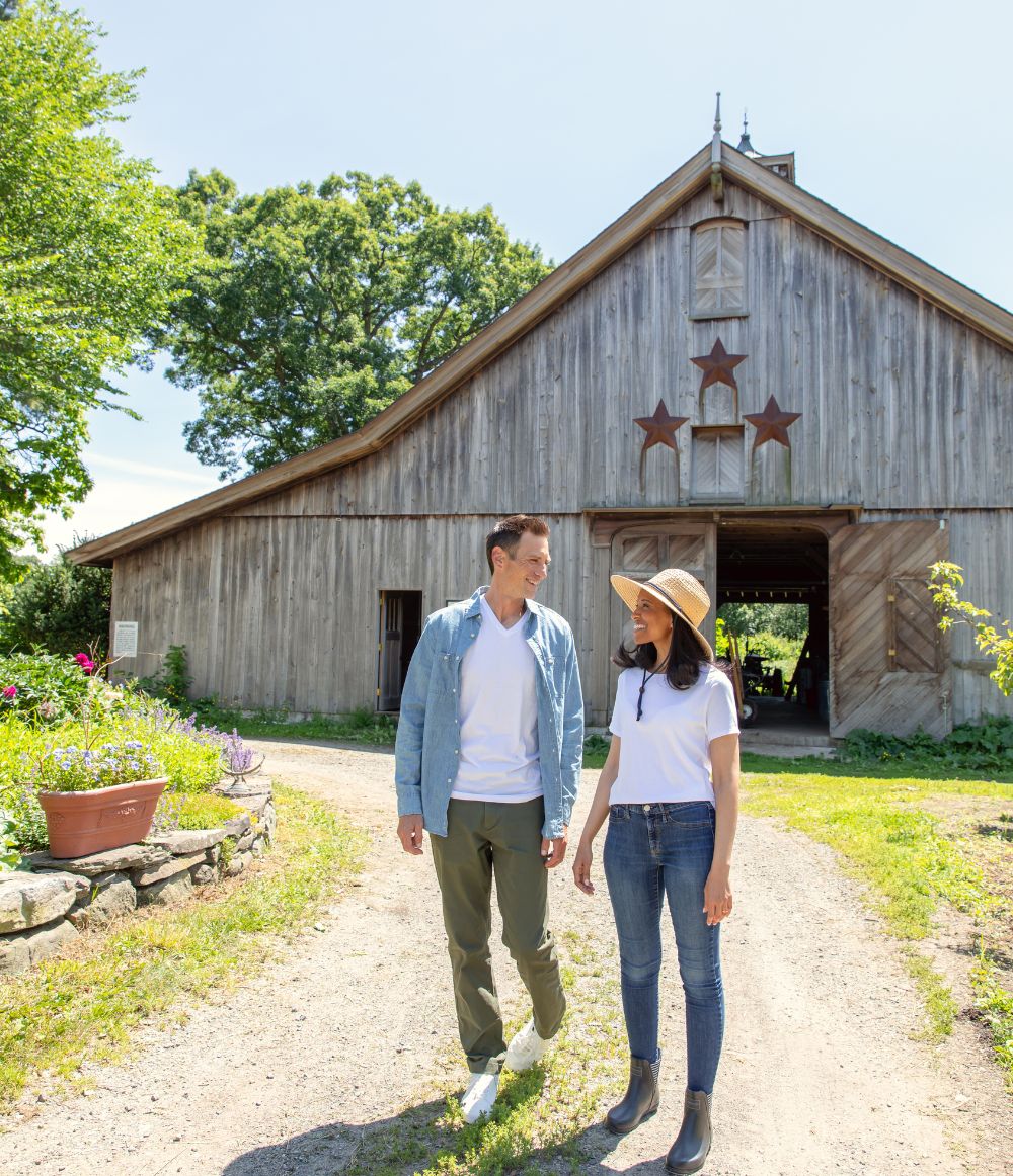 Couple in front of a barn