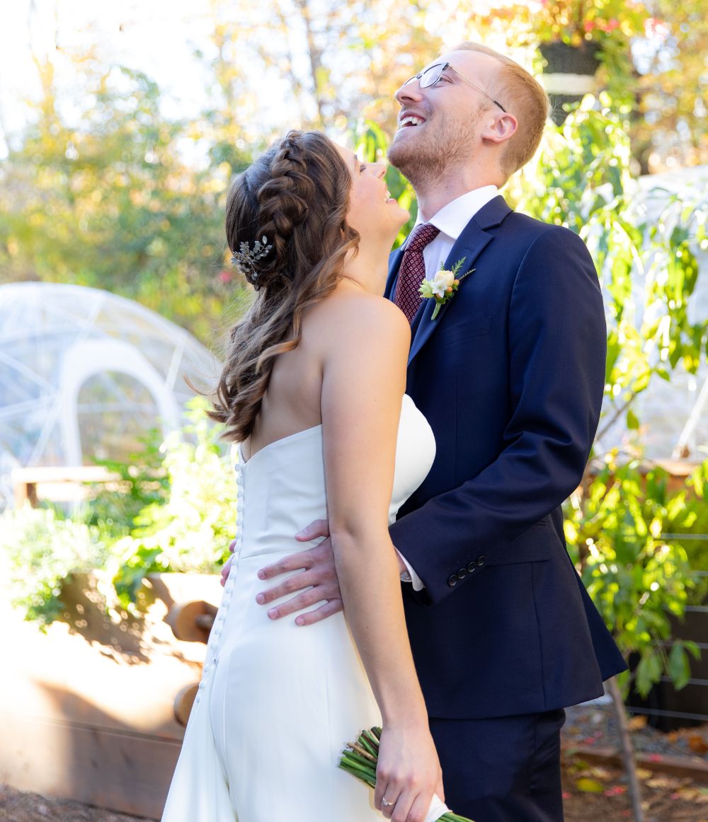 Married couple hugging outside