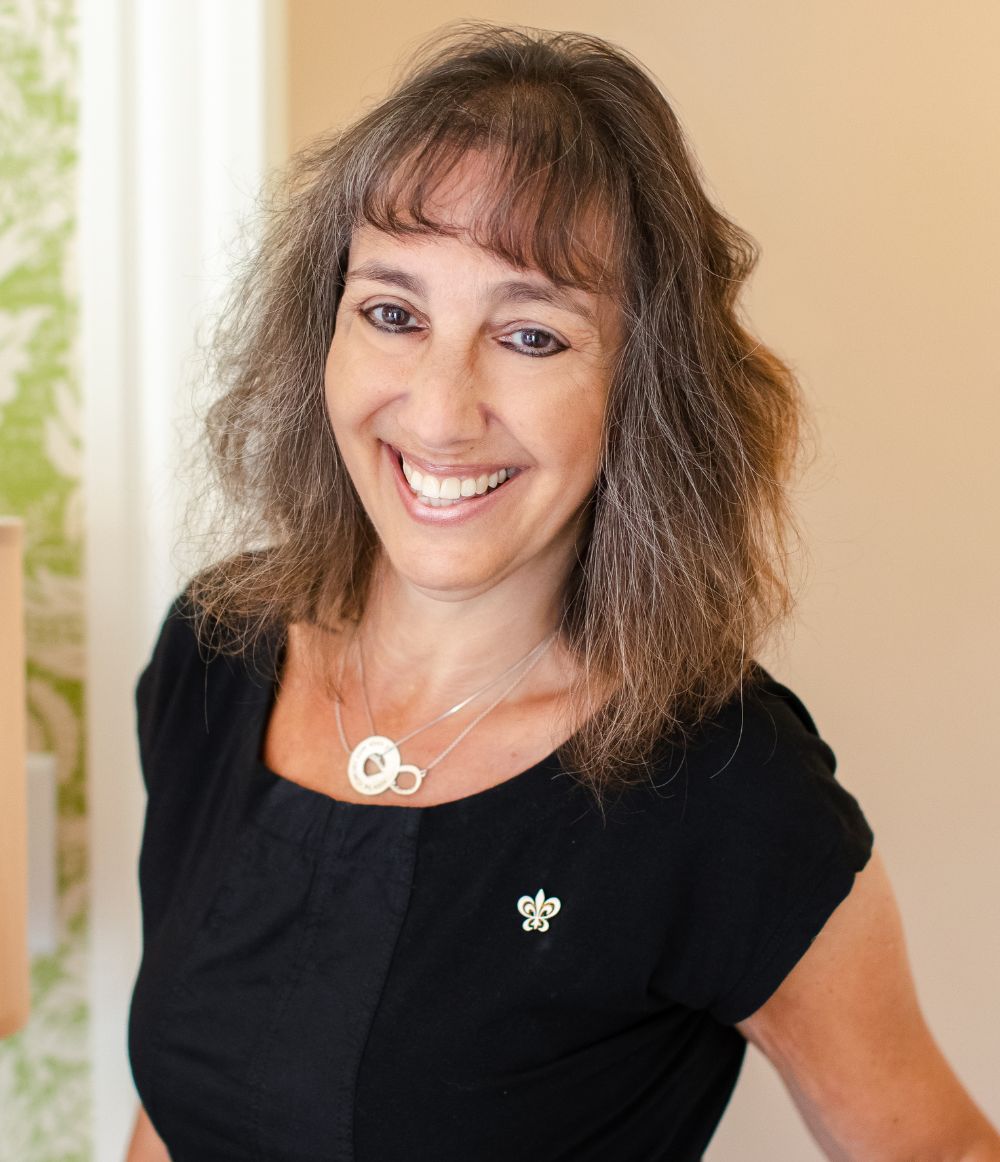 Woman smiling at the Inn at Hastings Park